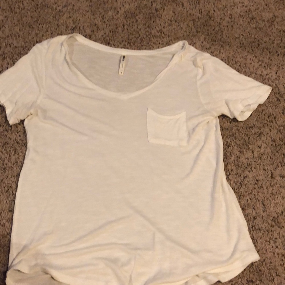 Tresics shirt. I got it from target. White shirt lose fit